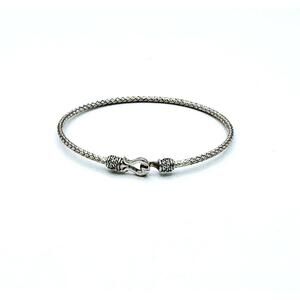 Sterling silver twisted cuff with clear crystal at hook and loop close